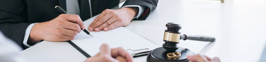 Collaborative divorce lawyer reviewing decree with client during consultation
